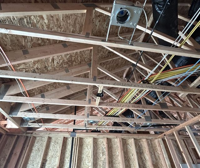 Plumbing rough in on custom home in framing